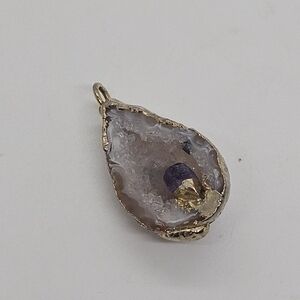 gold dipped geode pendant with amethyst